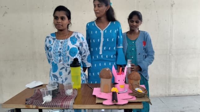 Students at the drawing and recycled collage competition