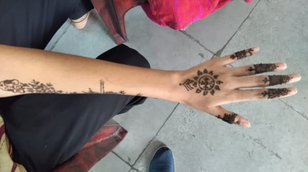 Students at the mehendi and hairstyle competition