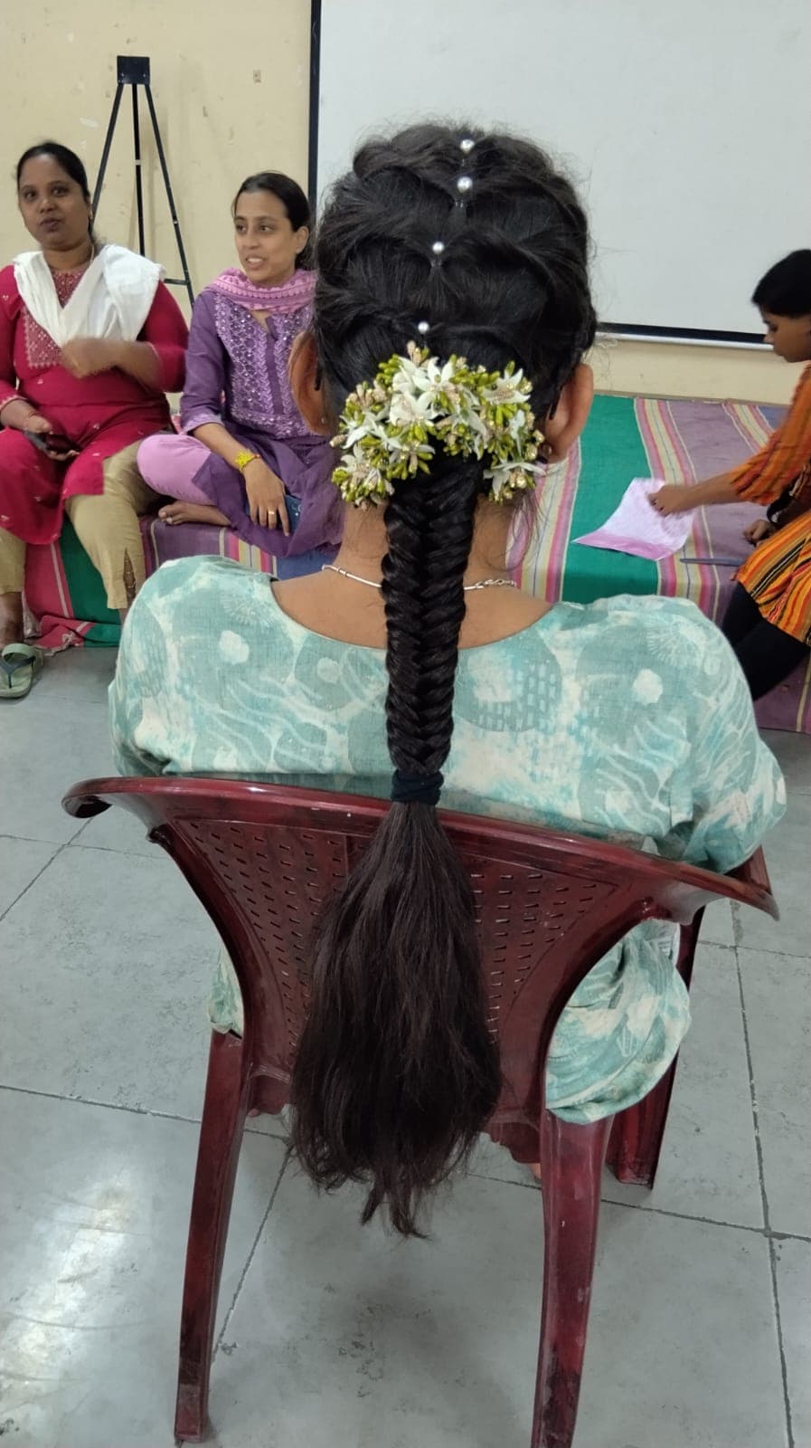 Students at the mehendi and hairstyle competition
