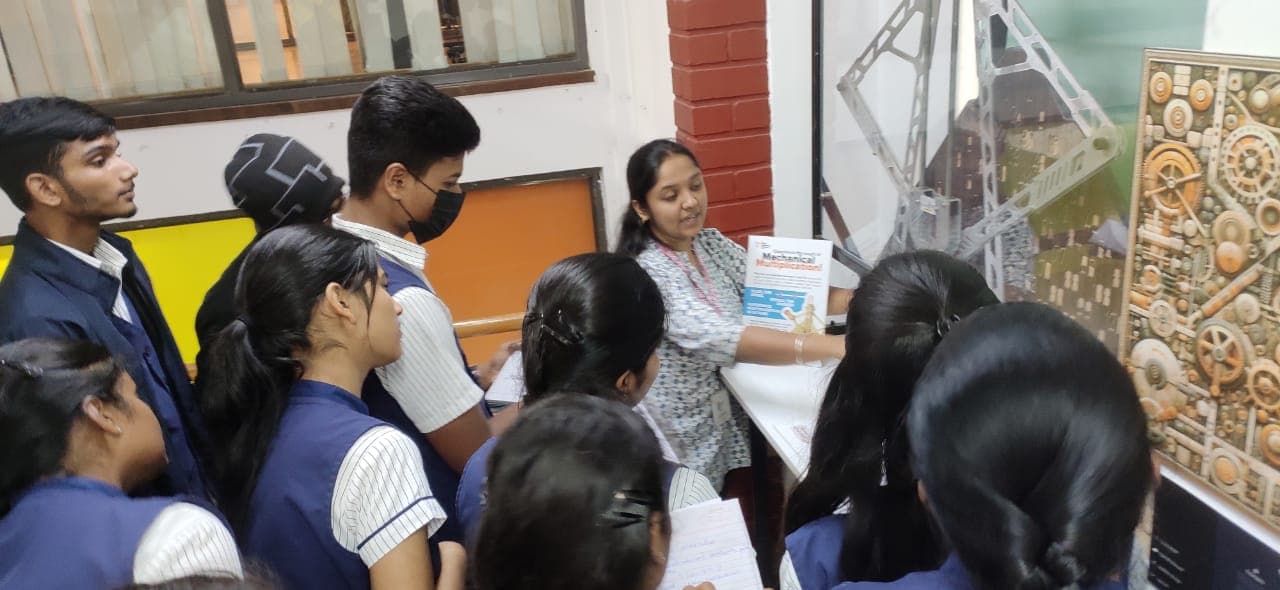 Students exploring exhibits at a science expo