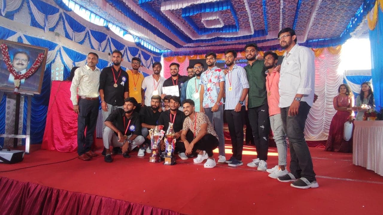 The winning sports team with their trophies