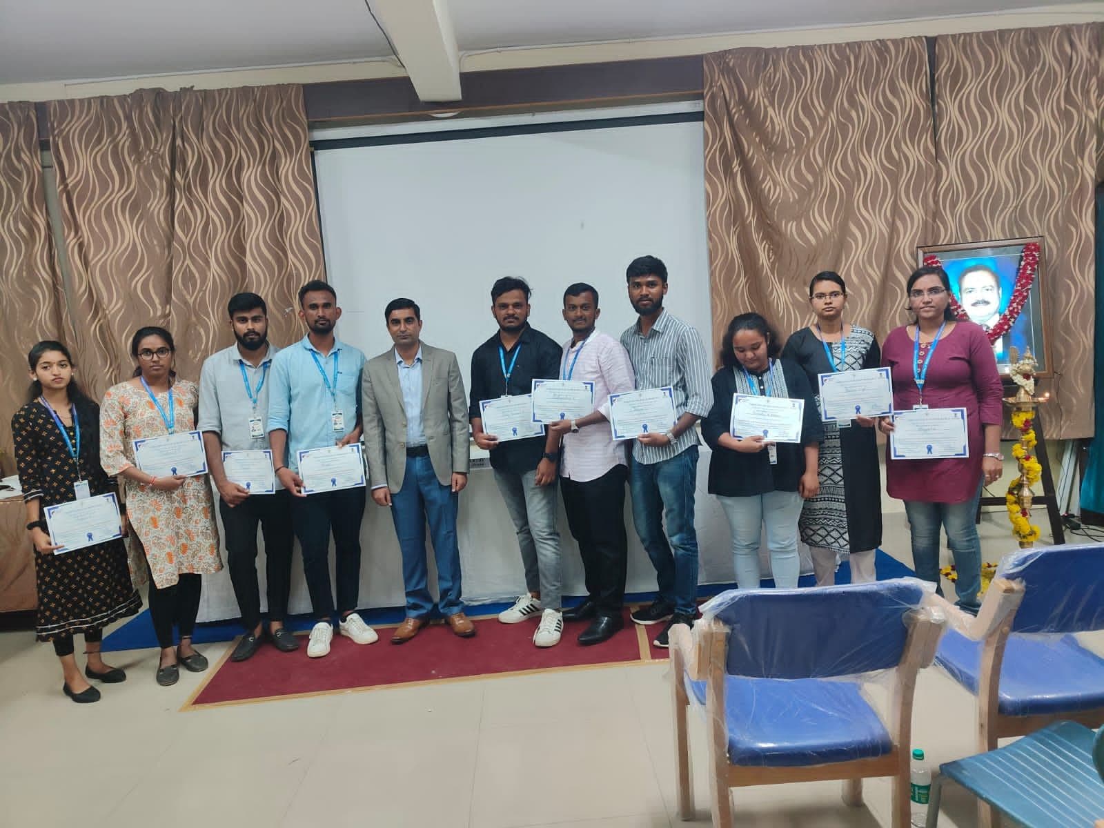 Participants receiving seminar certificates