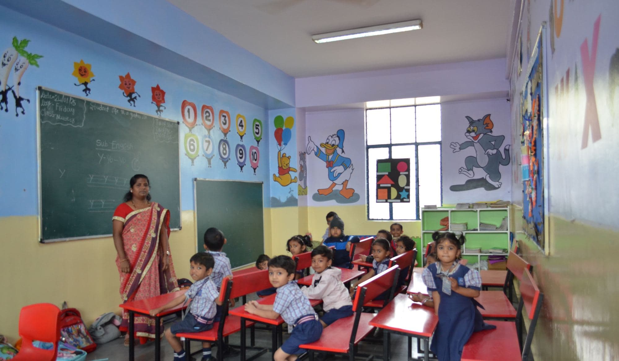 Kindergarten children with their teacher